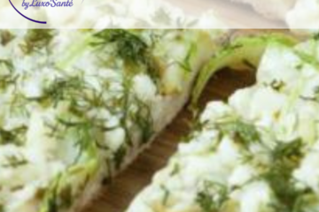 Pizza aux pommes, chèvre frais et miel, gros plan avec basilic ciselé